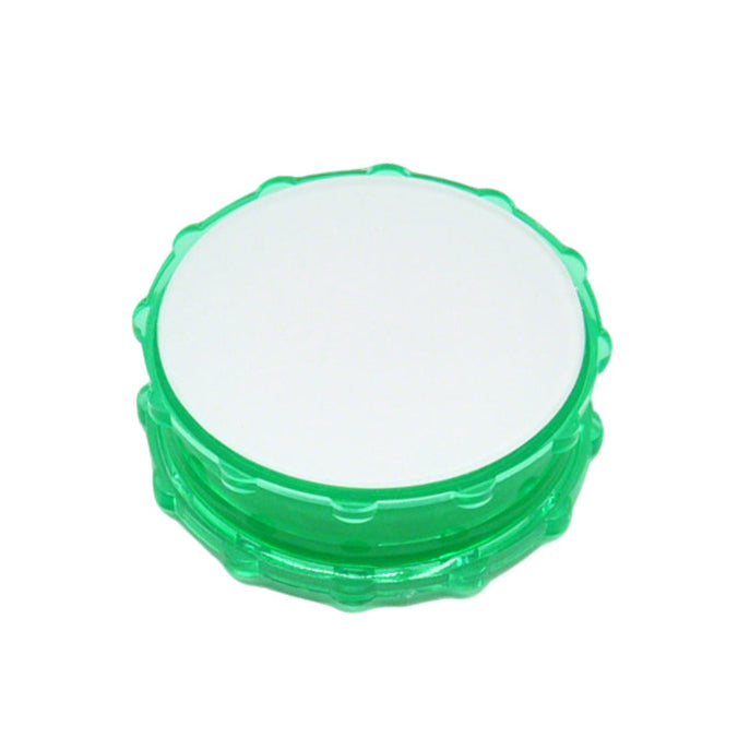 Plastic Herb Grinder Sublimation Blank in green with a white printable top, ideal for custom herb grinder designs and sublimation crafts.