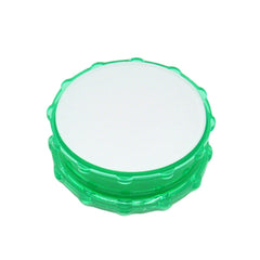 Plastic Herb Grinder Sublimation Blank in green with a white printable top, ideal for custom herb grinder designs and sublimation crafts.