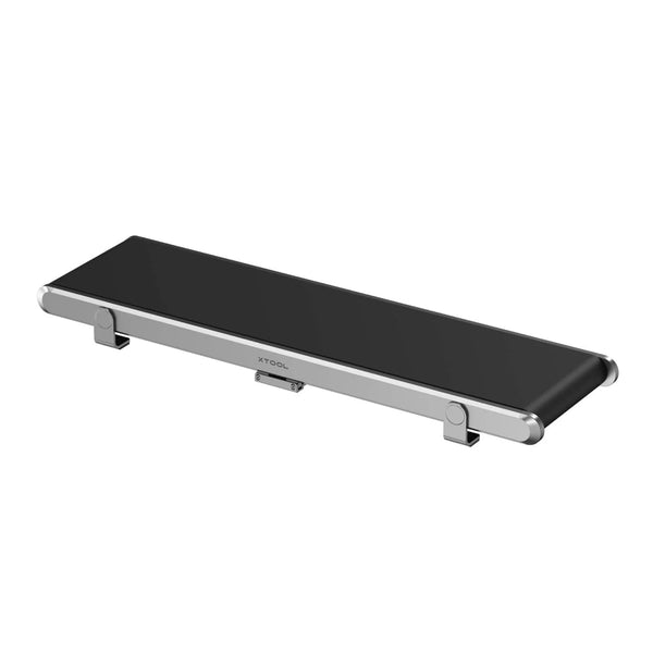 xTool F1 / F2 Ultra - Auto Streamline™ Conveyor with sleek black surface, designed for precise laser engraving batch processing.