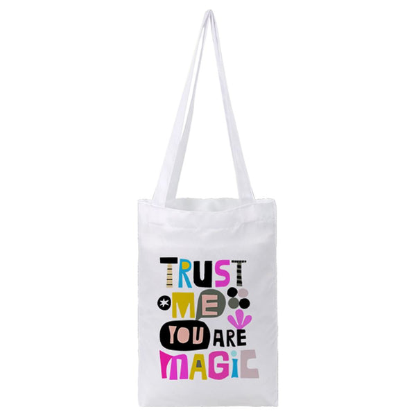 White sublimation tote bag with colorful 'Trust me you are magic' text, ideal for laser engraving