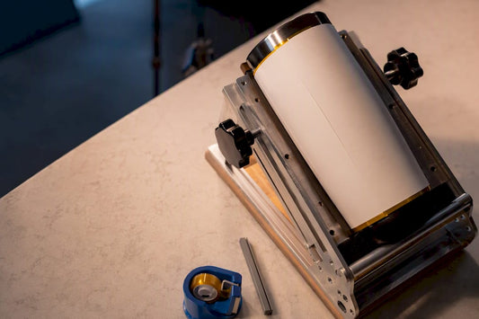 Silicone wrap clamped around tumbler edge