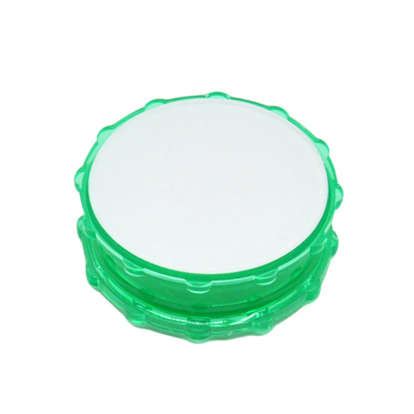 Plastic Herb Grinder Sublimation Blank in green with a white printable top, ideal for custom herb grinder designs and sublimation crafts.