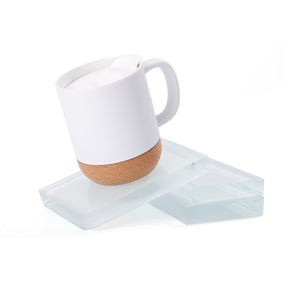 13oz sublimation coffee mug with matte white finish and detachable cork base, displayed on clear glass blocks for modern kitchen decor appeal.