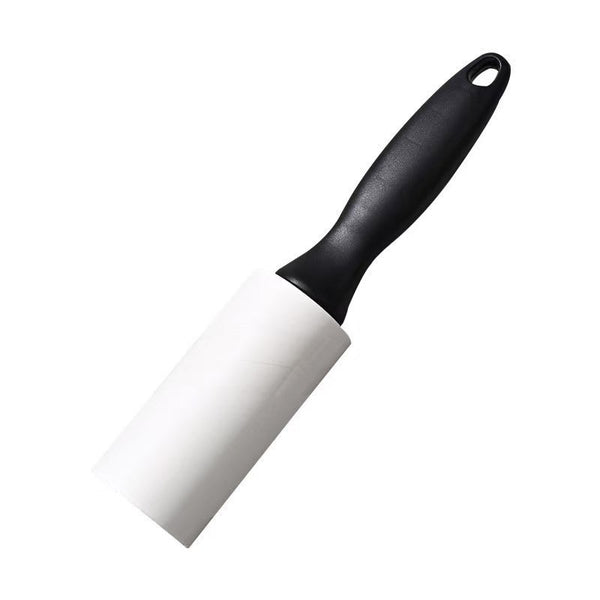 Lint Roller + Handle with black ergonomic grip and adhesive roll, ideal for removing lint, dust, and pet hair from clothing and fabrics.