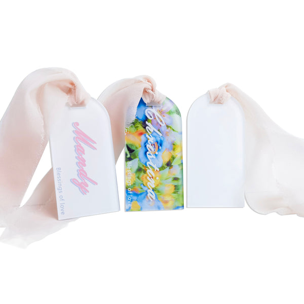 Sublimation Wedding Seat Tag 90x45x4mm with soft pink ribbon, featuring custom names and floral designs for elegant wedding seating decor.