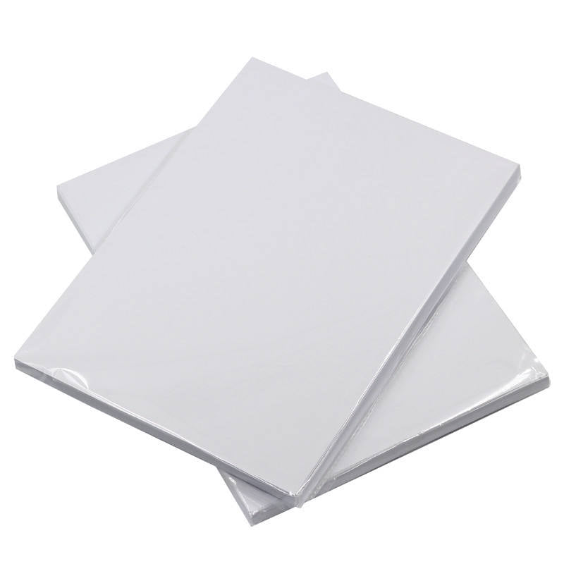 A4 Badge Printing Paper 100sheets stacked in three sealed packs, ideal for badge making, sublimation inserts, and craft printing projects.