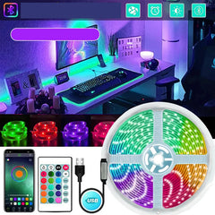 RGB LED strip lighting setup on gaming desk with colorful ambient lighting