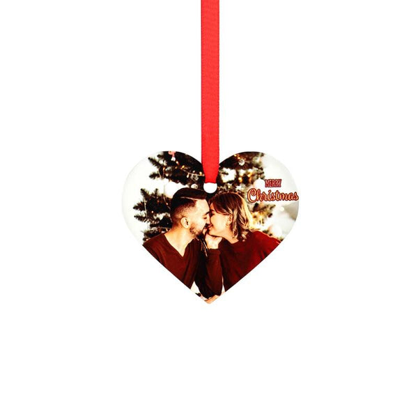 Heart-shaped sublimation blank Christmas ornament with photo, red ribbon, and festive text.